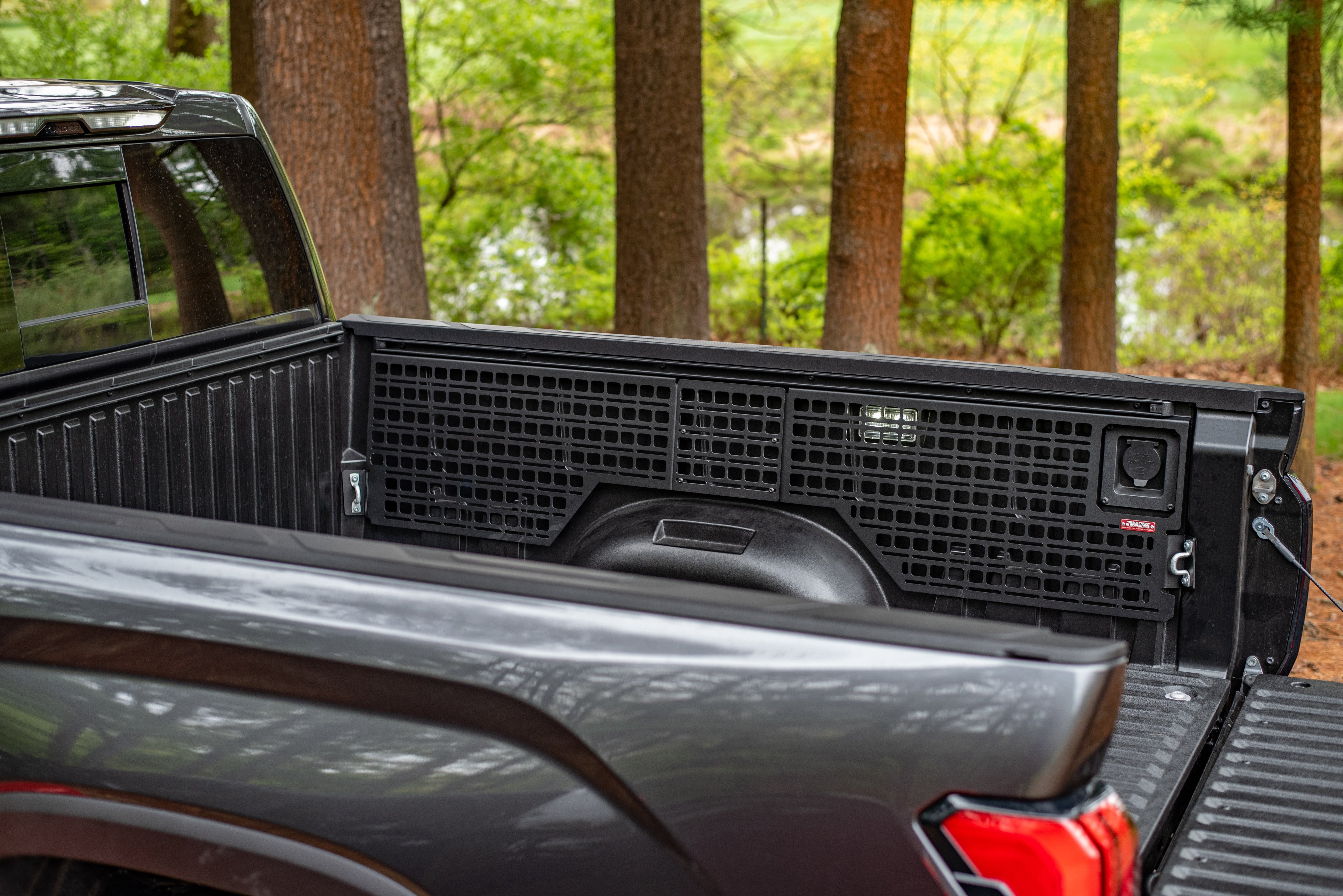 Photo of a Bedside Rack on a Toyota Tundra with a forest background