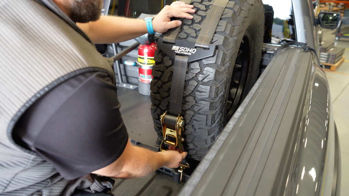 Mounting our SDHQ Built Chase Rack Spare Tire Carrier in the 2024 Rapt ...