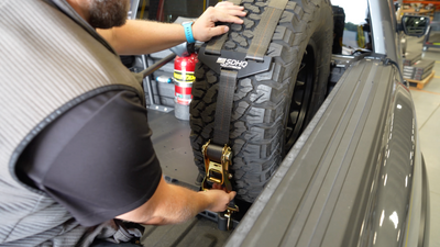 Mounting our SDHQ Built Chase Rack Spare Tire Carrier in the 2024 Raptor Build